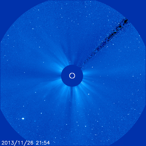 This movie shows Comet ISON orbiting around the sun – represented by the white circle -- on Nov. 28, 2013. ISON looks smaller as it streams away, but scientists now believe its nucleus may still be intact - Credit: Image Credit:  ESA/NASA/SOHO/Jhelioviewer